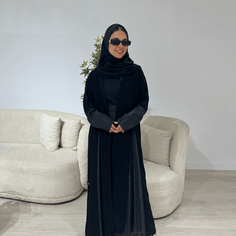عباية سوداء لف كريب ملكي مع اورقنزا لماع ( عباية نون)