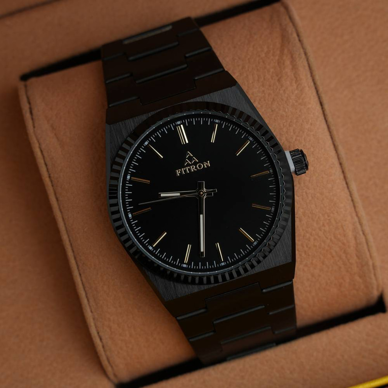 Watch fluted bezel