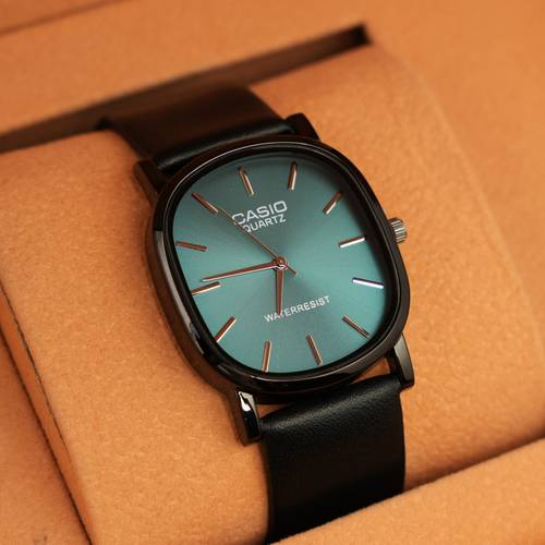 CASIO TEAL BLACK