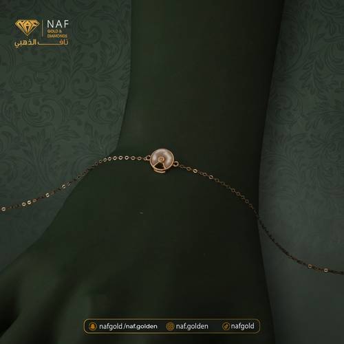 سواره ذهب عيار 18 الوزن 0.7 تقريبا. 