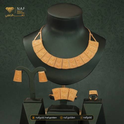 طقم ذهب أصفر عيار 21 الوزن 114.29 تقريبا 