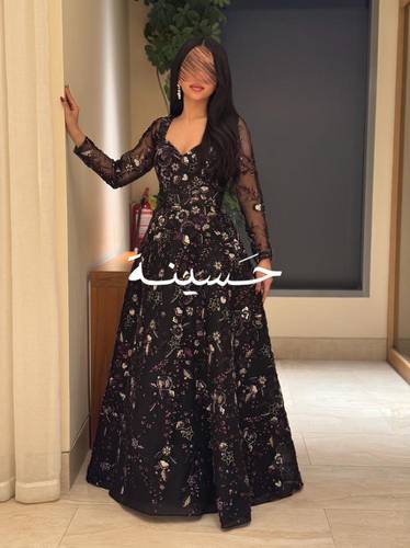 فستان سهره اسود كلوش بنقش وكم طويل