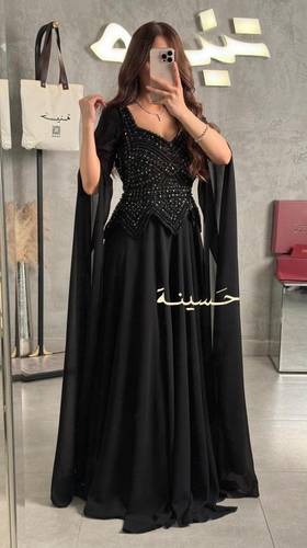 فستان أسود ساحر بتطريز يدوي فاخر
