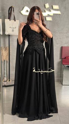 فستان أسود ساحر بتطريز يدوي فاخر