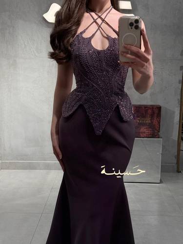 فستان بنفسجي ملكي بتصميم حورية البحر