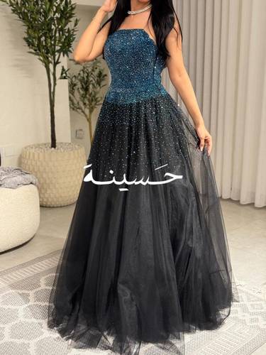فستان سهرة طويل تل أسود بتوب كورسيه تركواز لامع