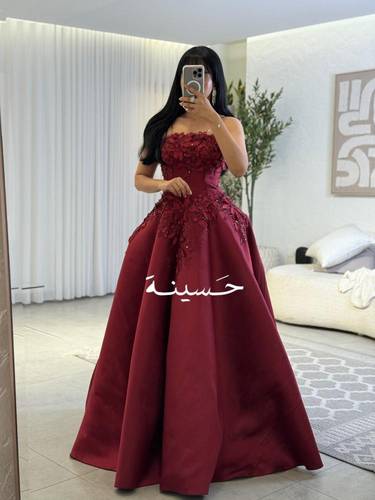 فستان سهرة كورسيه مزين بورود في الصدر و الخصر