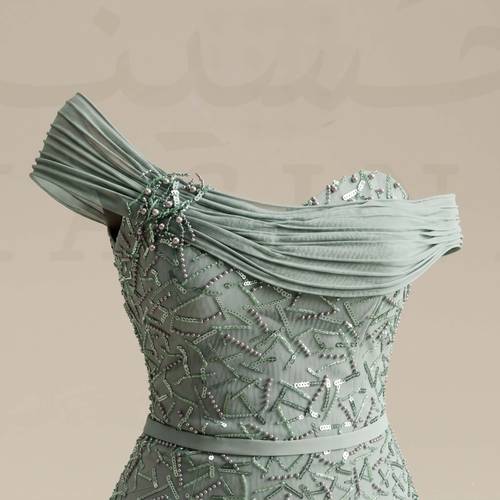 فستان سهرة نعناعي طويل ترتر وخرز كورسيه بتصميم أوف شولدر وشال رقبة