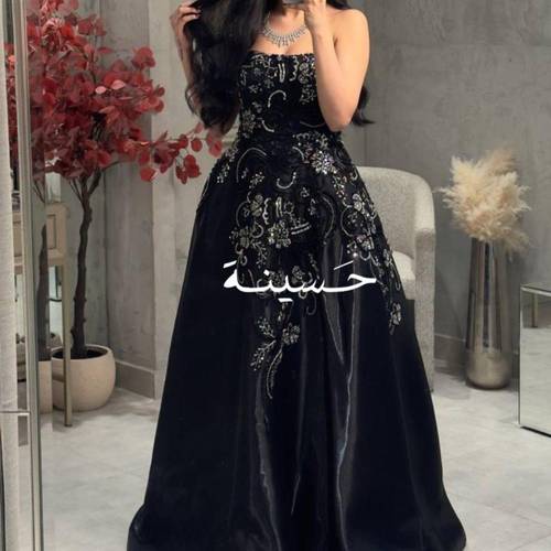 فستان اسود توب كلفه ذهبيه