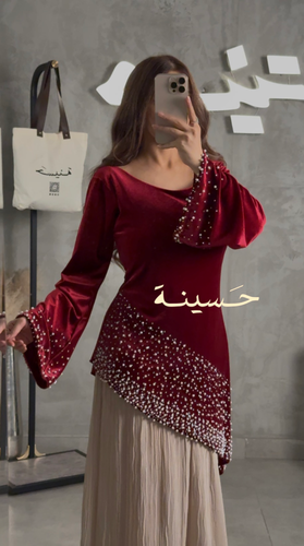 فستان فاخر بتصميم يجمع بين النعومة والترف