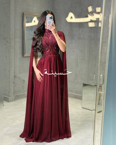 فستان منيرة الاحمر