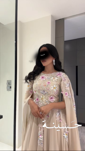 فستان بيج فخم مطرّز بورود