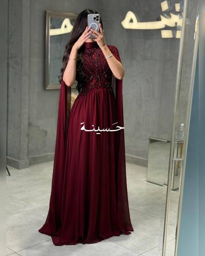 فستان منيرة الاحمر