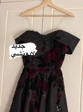 فستان سهرة أسود فخم مصنوع من قماش الميكادو الساتان،