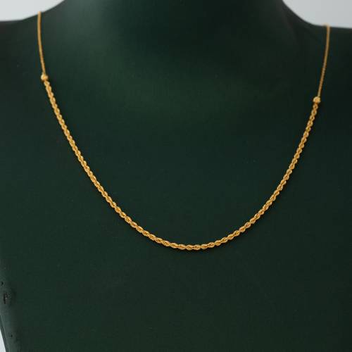 21 Karat Twisted Pendant