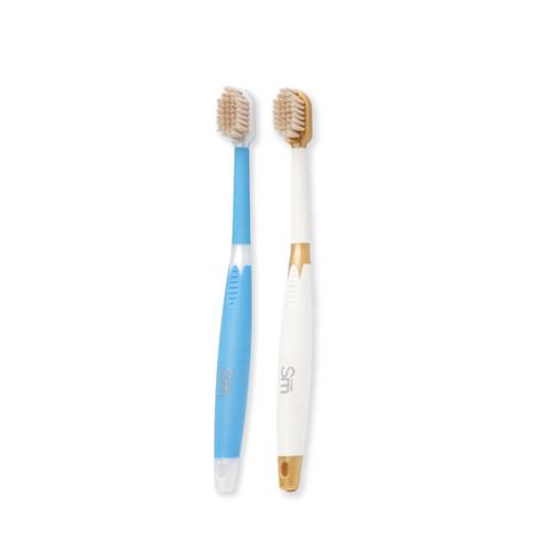 The Smart Deluxe Miswak Toothbrush with a flexible rubber handle