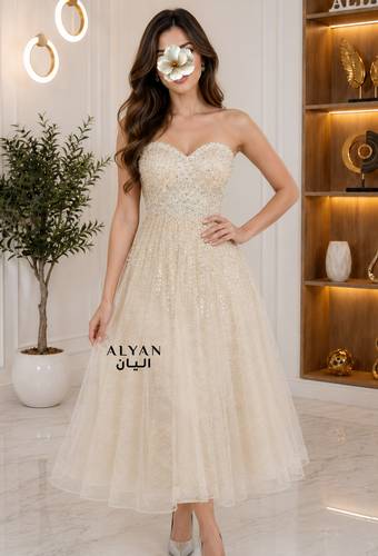 فستان سهرة ميدي بتطريز الصدر