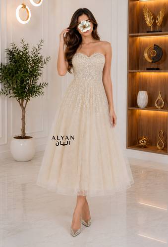 فستان سهرة ميدي بتطريز الصدر