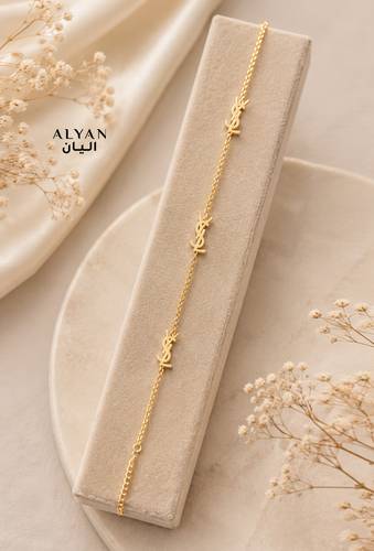 إسوارة YSL الكلاسيكية باللون الذهبي