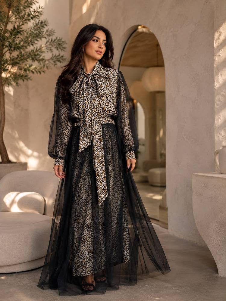 A sophisticated and feminine ensemble crafted 