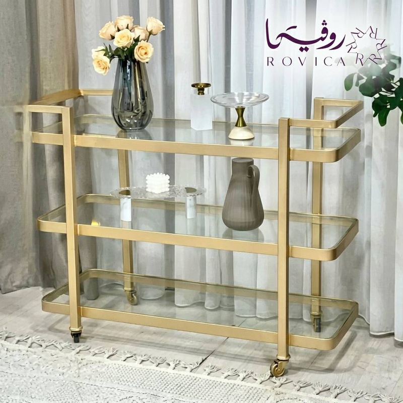 عربة تقديم ترلي ذهبي مع سطح زجاجي وأرفف متعددة بتصميم فاخر  Rovica