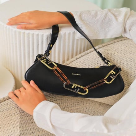 ‎  شنطة نسائية باللون الأسود_image_0