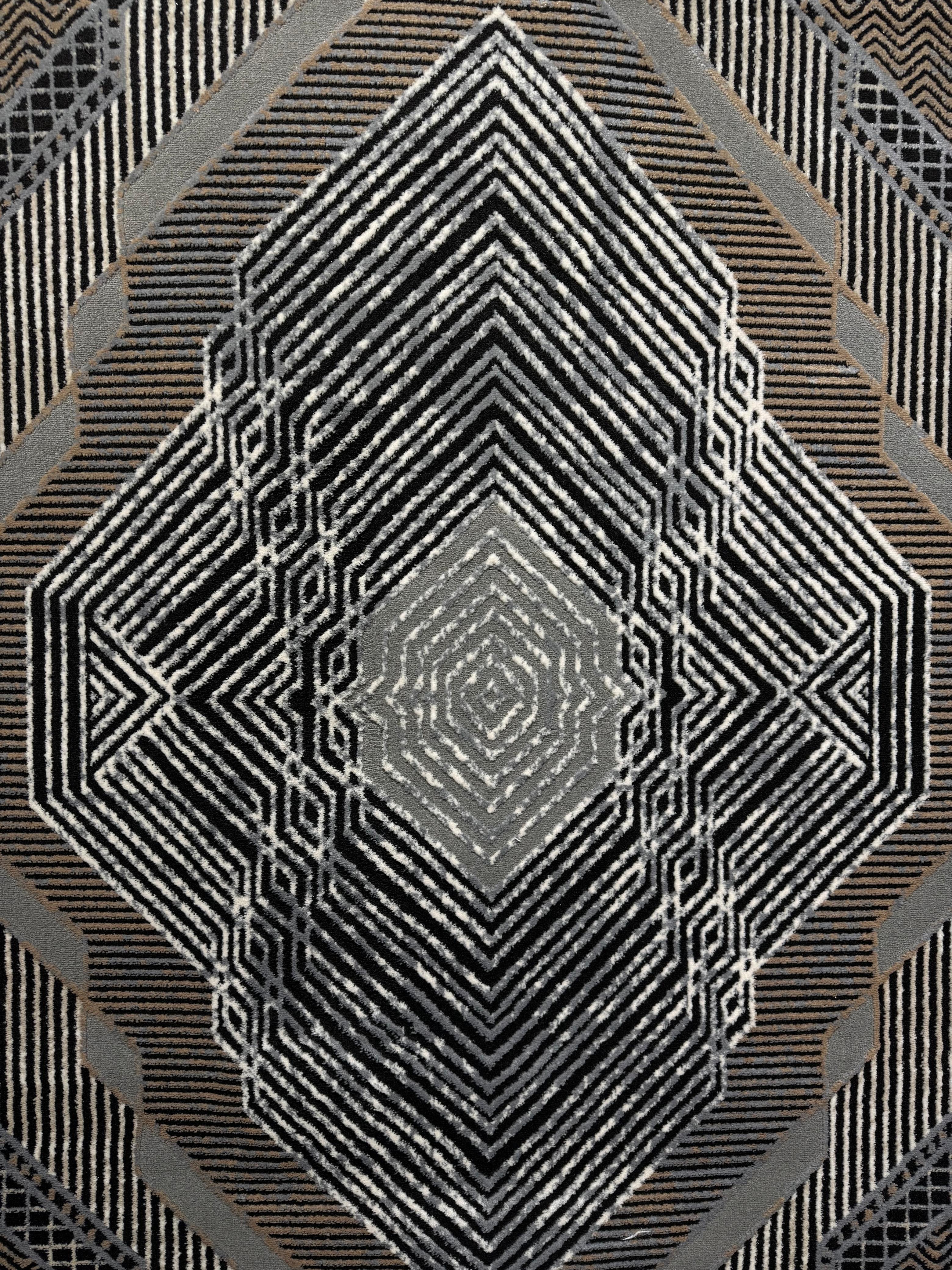 تصميم هندسي تكراري أبيض وأسود