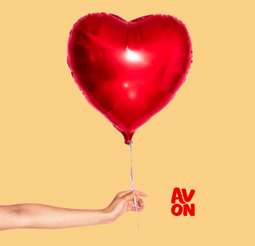 Red heart-shaped helium balloon.