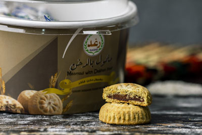 معمول بالدخن فاخر عبوة دائريه ورق غطاء شفاف  400 جرام 