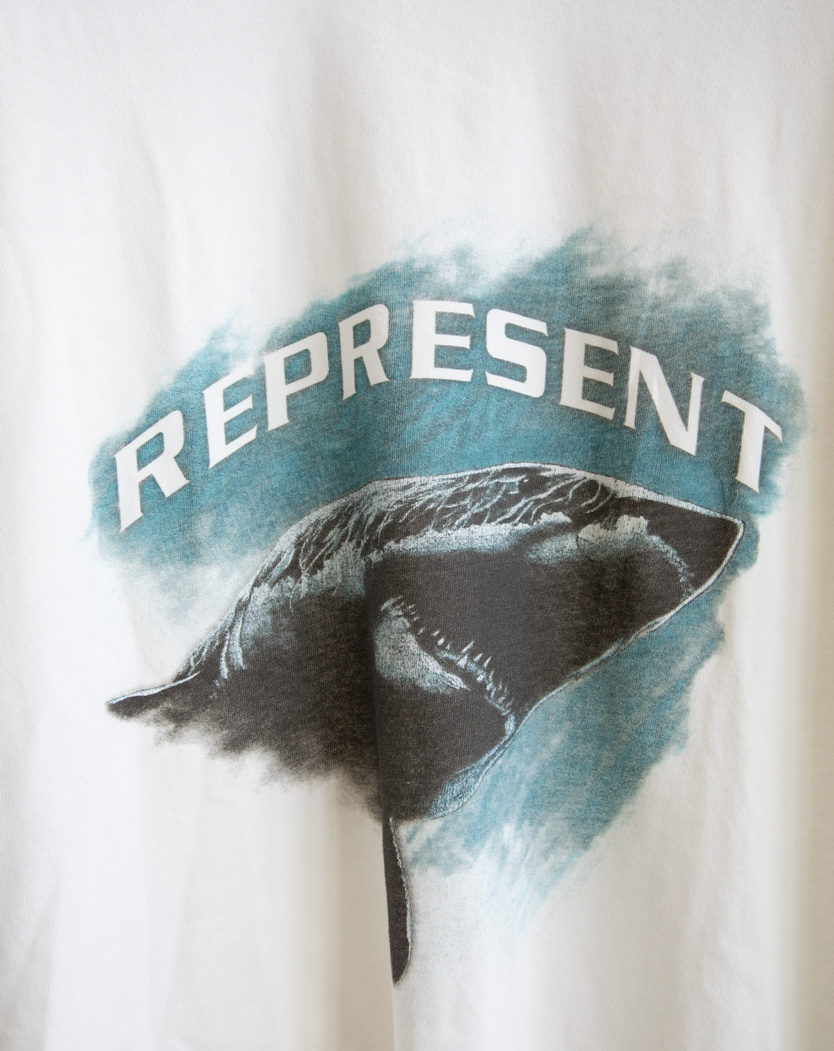 Represent shrak T-shirt 