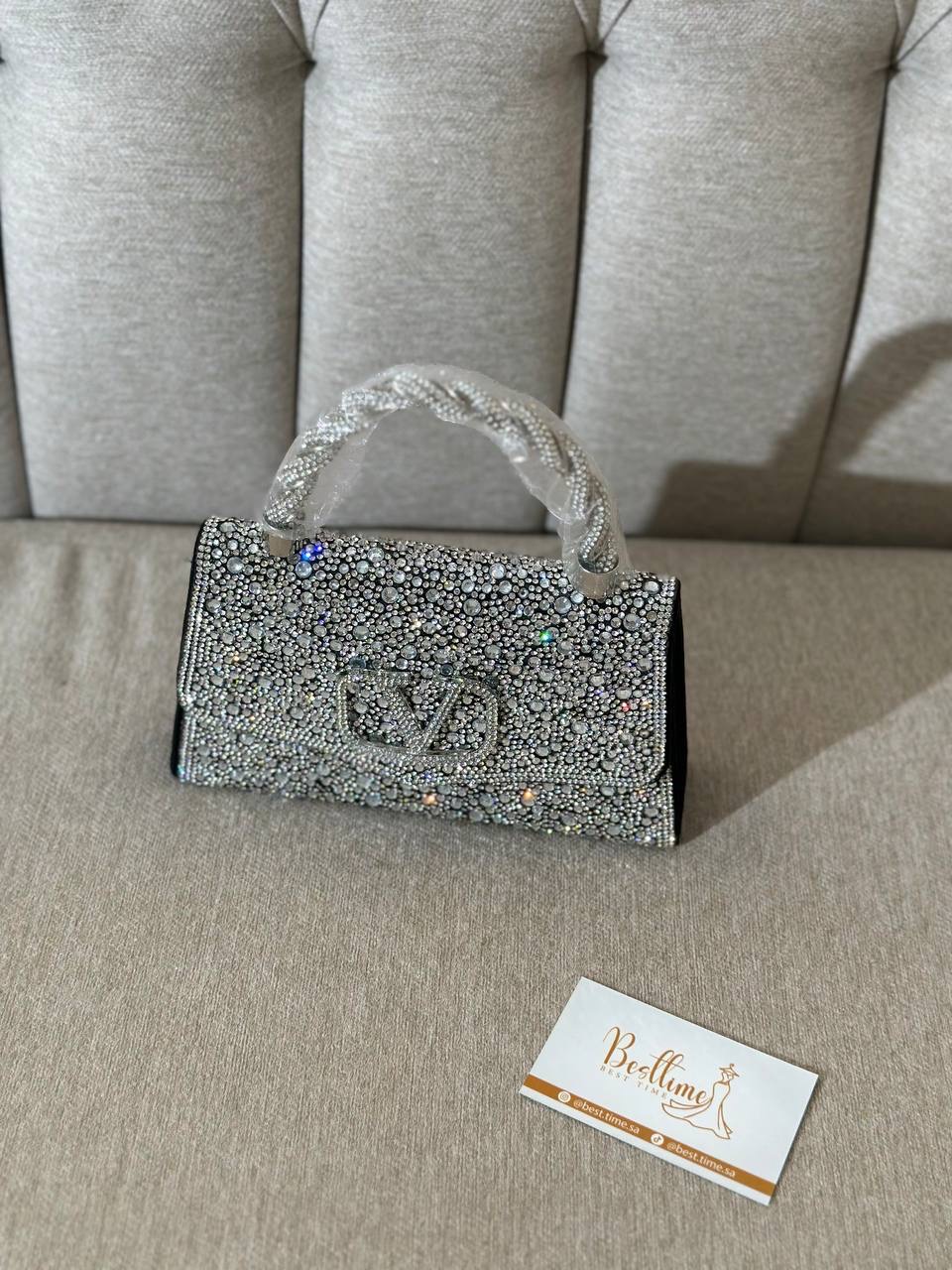  شنطة راقي فضي واسود 