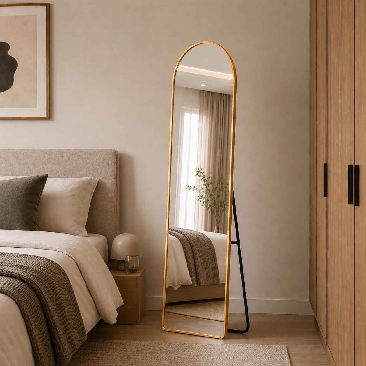  Gold arched standing mirror in modern bedroom 