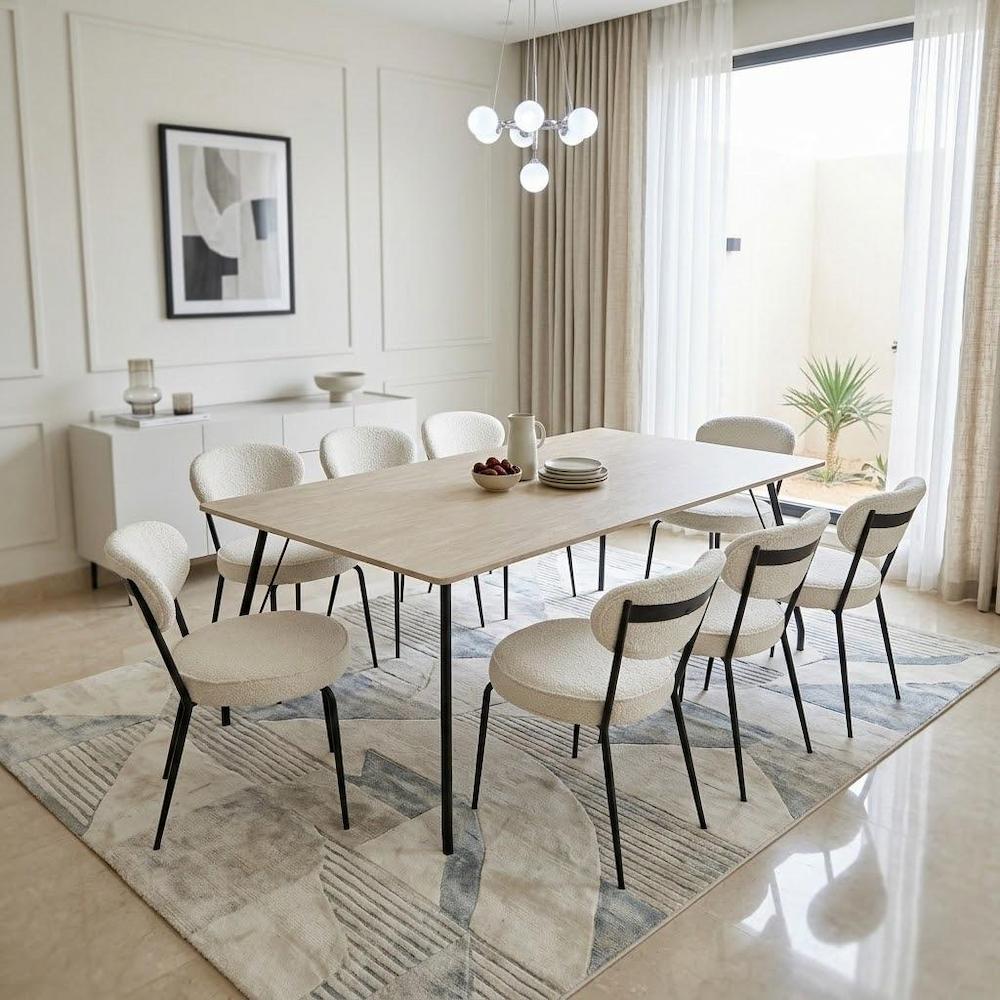  180x100 dining table with 8 beige chairs in modern room 