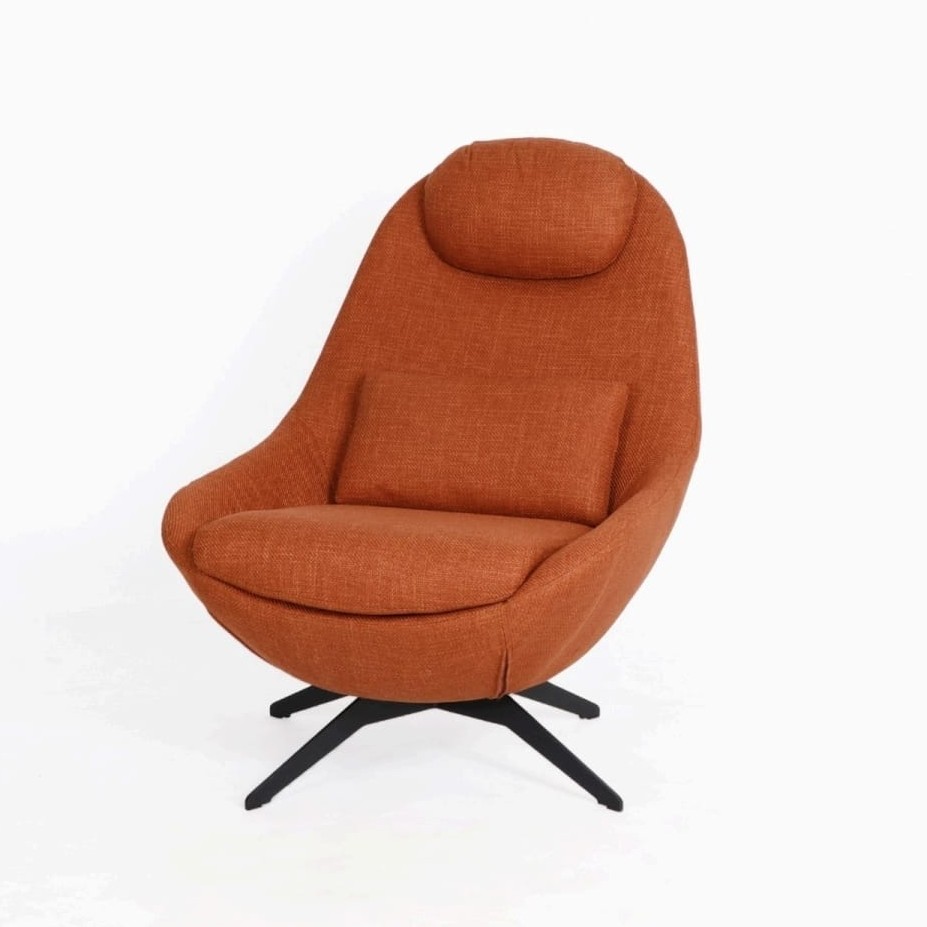  Orange lounge chair with soft details and swivel base 