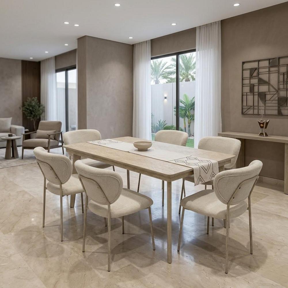  Dining table with 6 fabric chairs in beige in modern dining room 