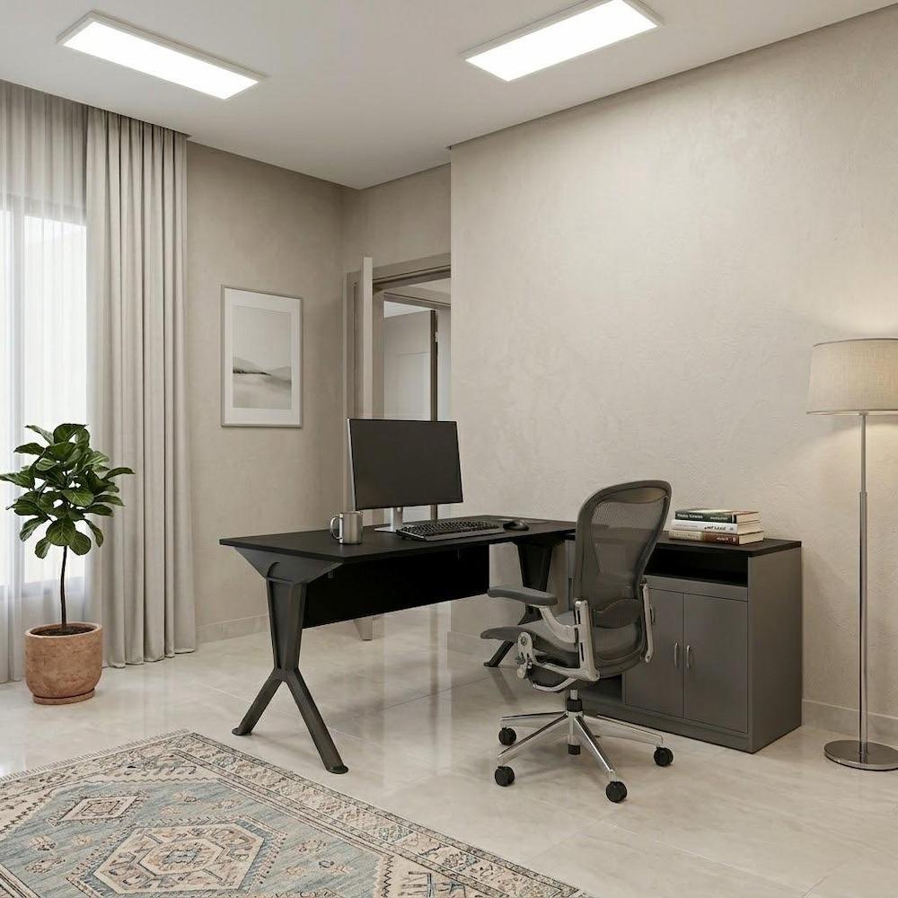  Black work desk with storage unit in an elegant home office 