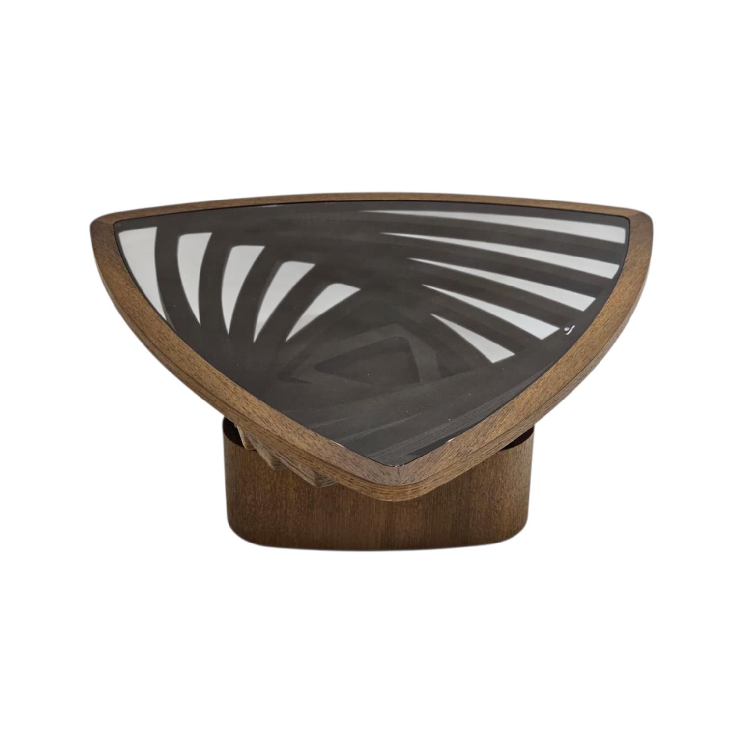  Dark glass tea table with curved wooden frame in modern design 