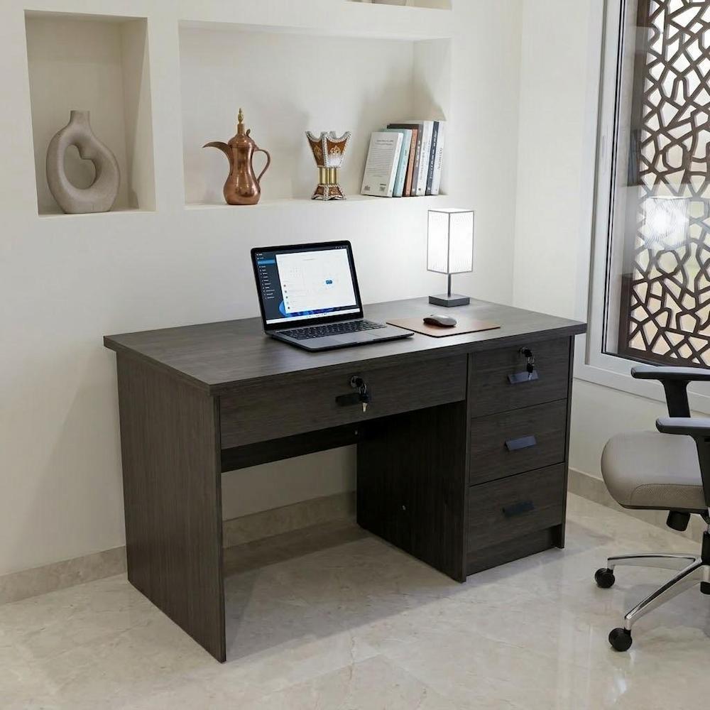 Dark brown wooden desk with drawers in home office setup 