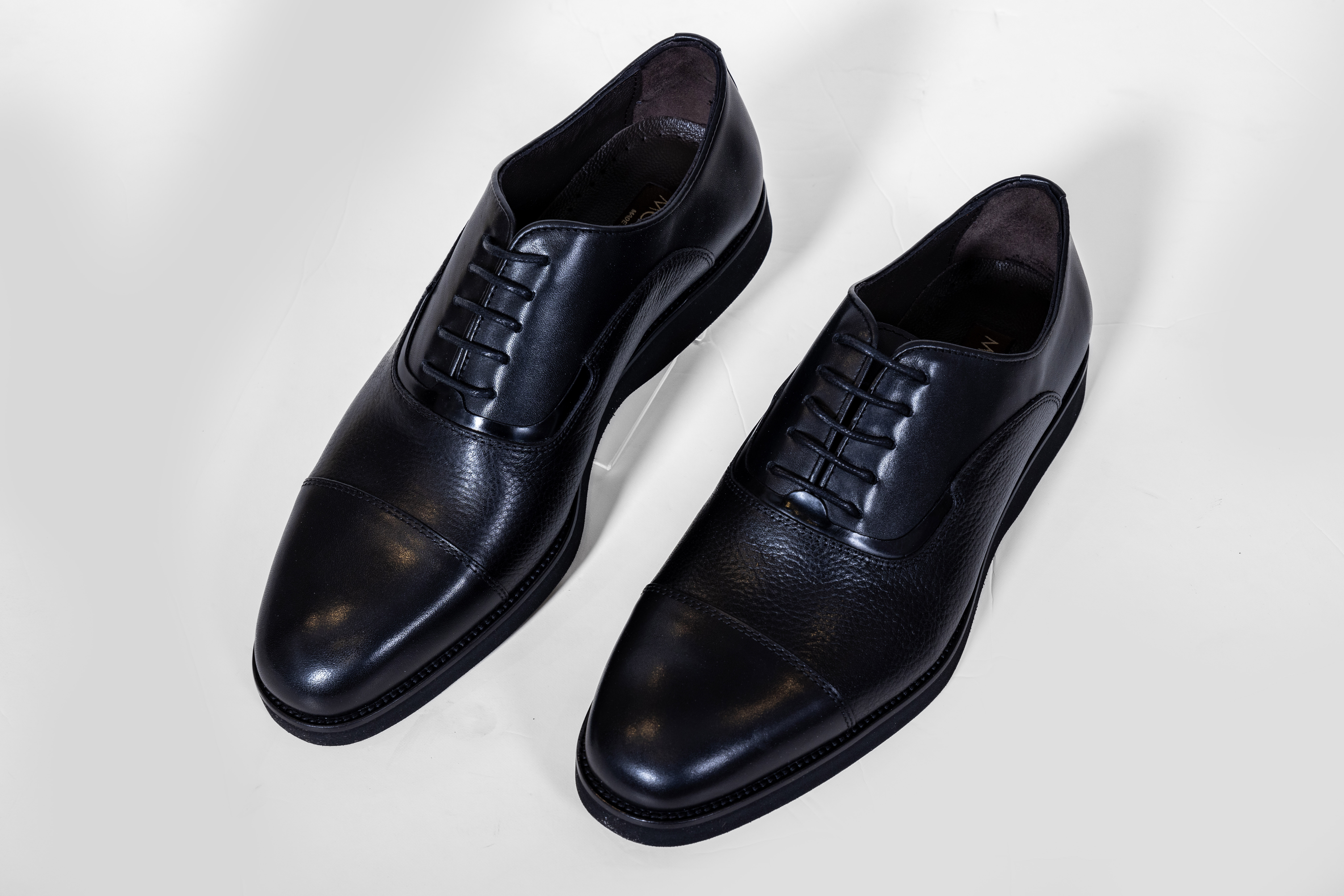 Pair of black leather dress shoes