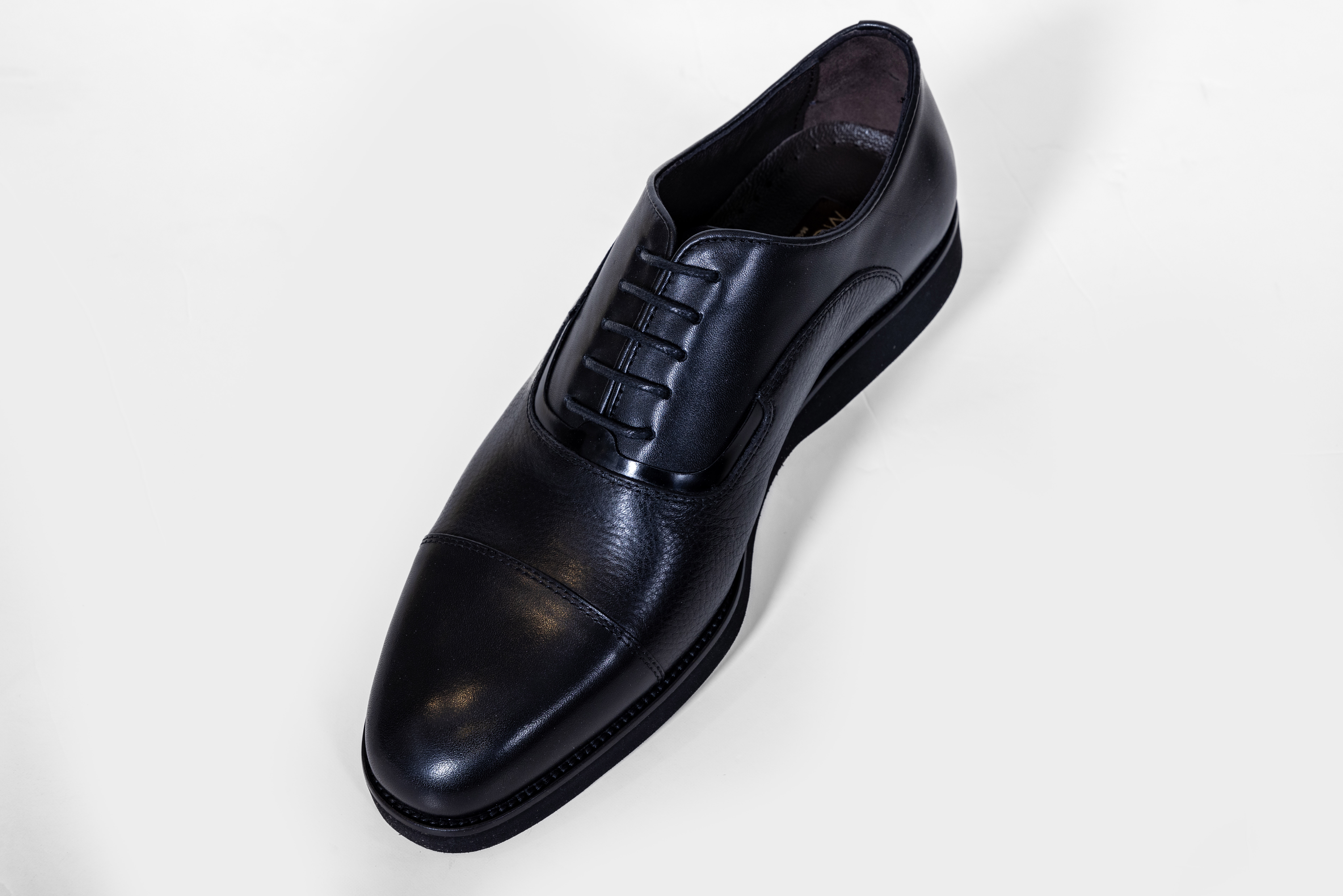 Black leather dress shoes with laces