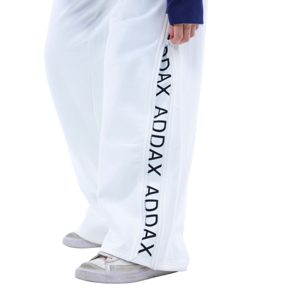 بنطال ADDAX  بنطال أبيض واسع  zipline pants  بنطلون سحاب جانبي  بنطال هوية  white streetwear pants  بنطال للجنسين  بنطال رياضي فاخر  ADDAX pants  premium white pants