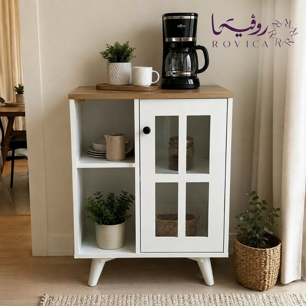 كورنر كوفي صغير أبيض من Rovica داخل مساحة منزلية أنيقة مع ديكور بسيط ونبات جانبي.