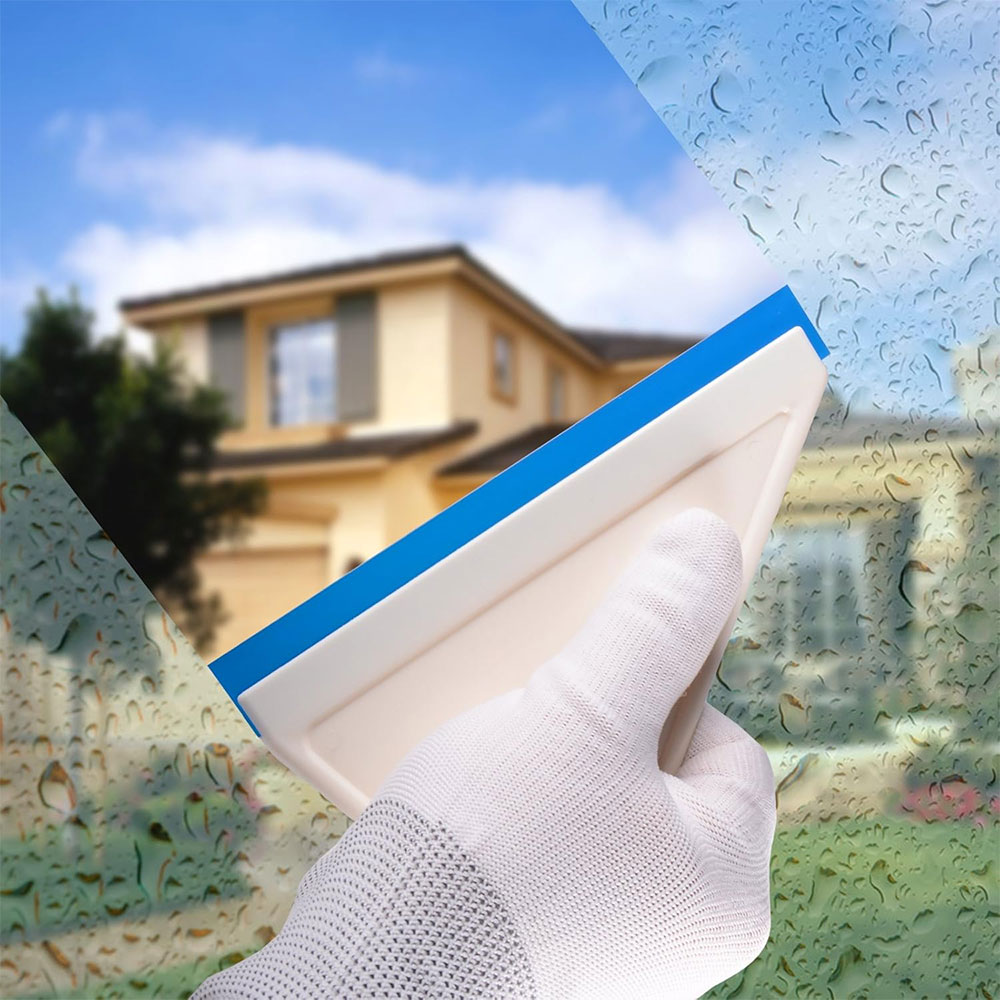 A white rubber squeegee with a flexible blue bottom blade dedicated to car tinting and vinyl installation