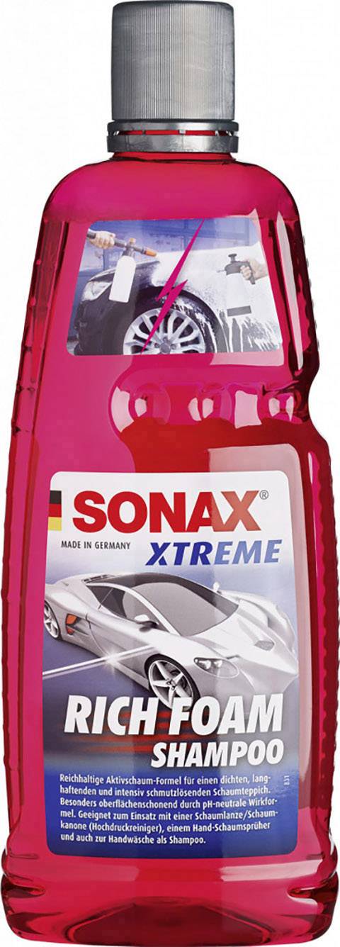 A 1L transparent red plastic bottle of Sonax Xtreme RichFoam Shampoo with a silver cap.