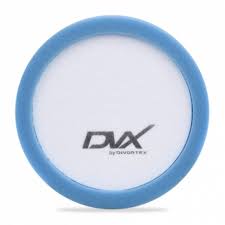 A soft round foam polishing pad in blue mounted on a yellow base engraved with the DVX logo