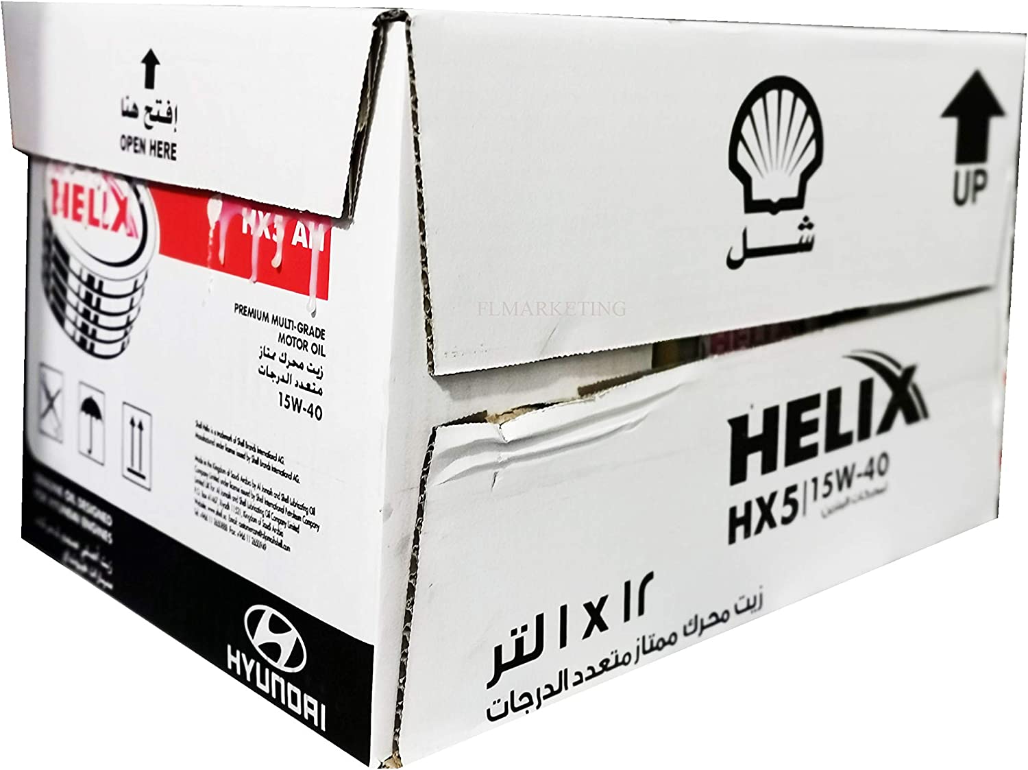 Shell Helix HX5 15W-40 motor oil carton containing 12 bottles