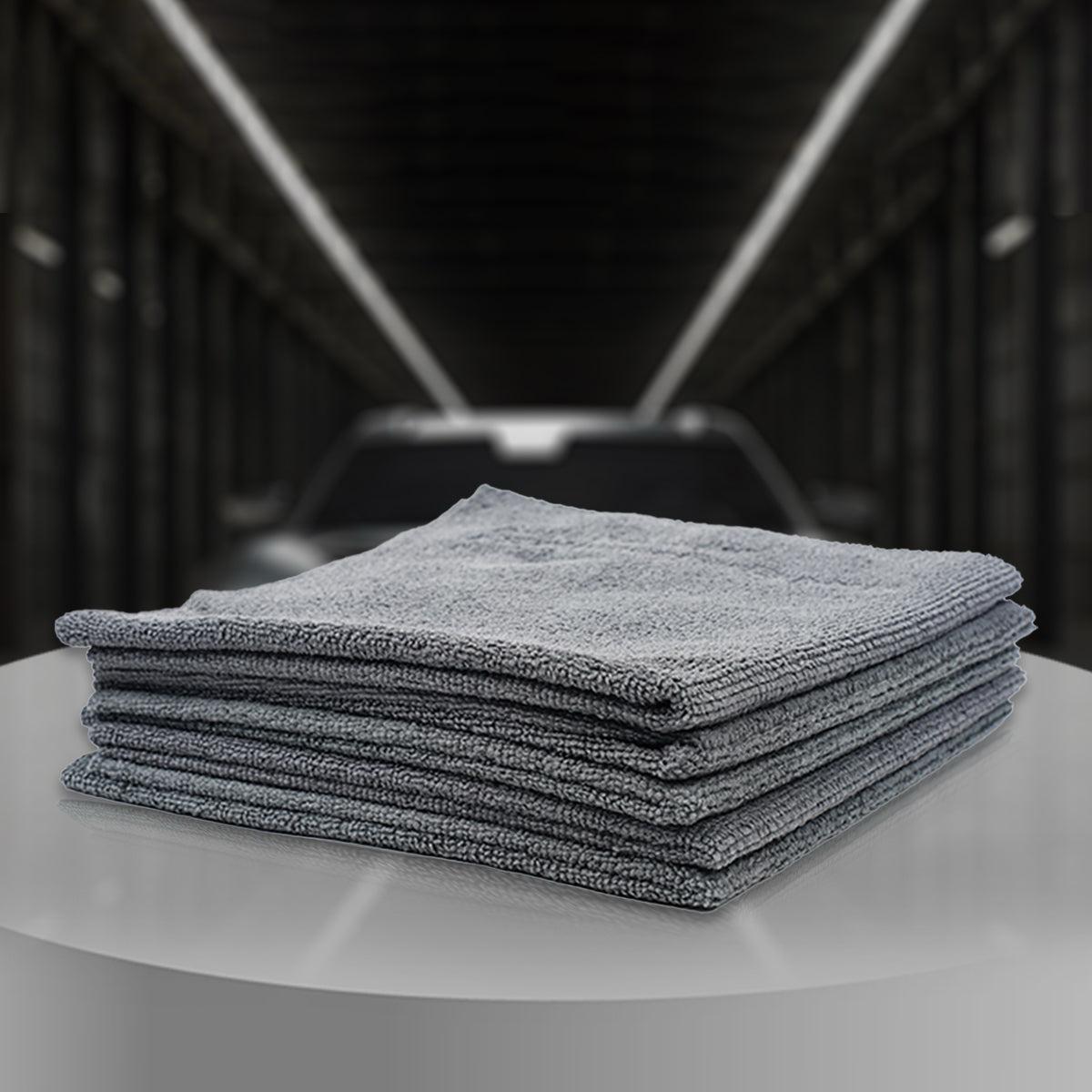 A set of five gray microfiber towels dedicated for car paint by the German company Koch-Chemie