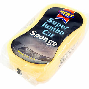 A large-sized yellow sponge, waved in the middle, dedicated to washing and cleaning cars