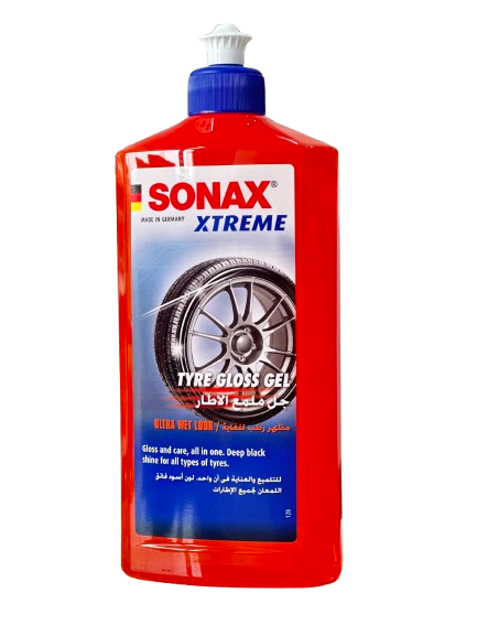 A 500ml orange bottle with a blue and white cap of Sonax Xtreme Tire Gloss Gel from Germany