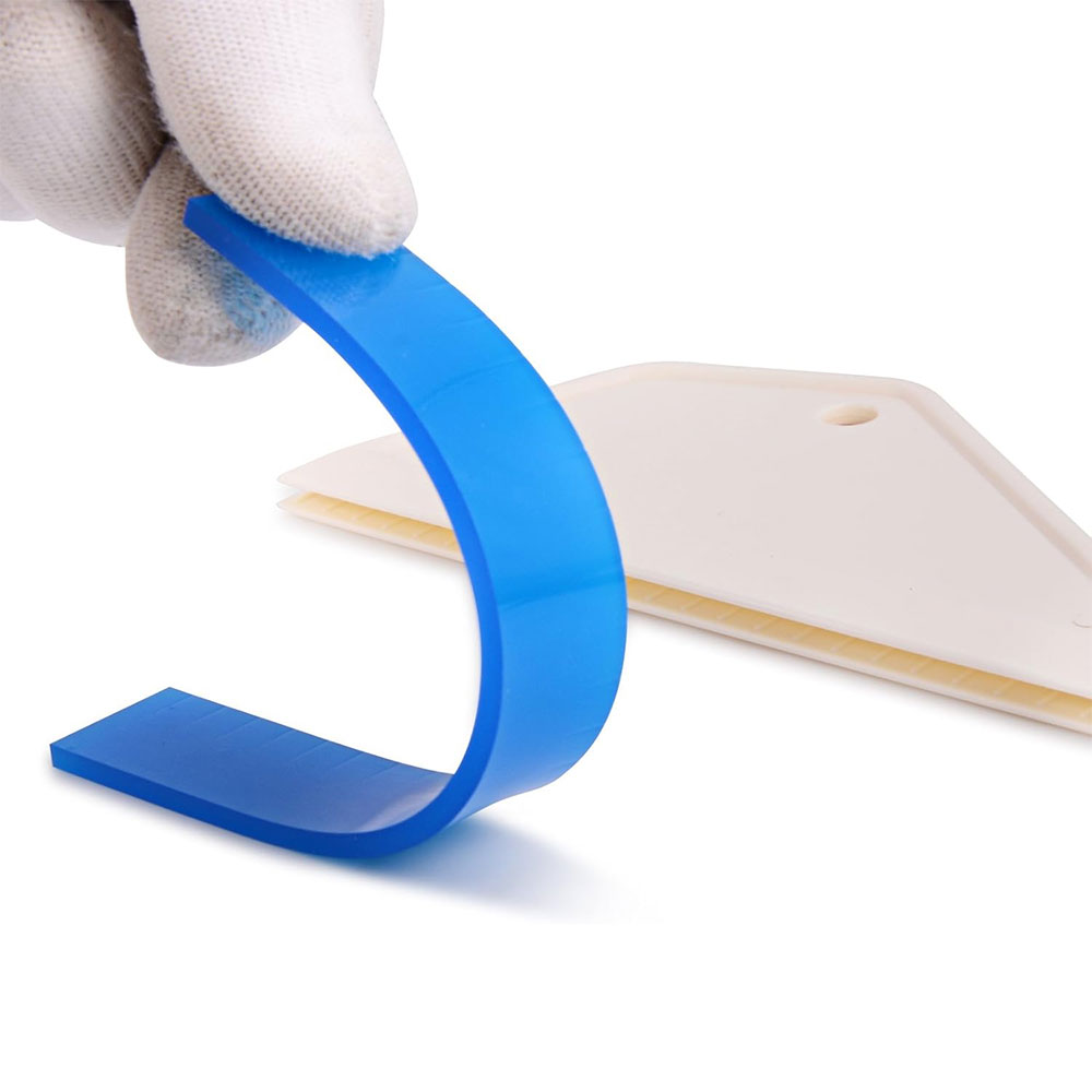 A white rubber squeegee with a flexible blue bottom blade dedicated to car tinting and vinyl installation